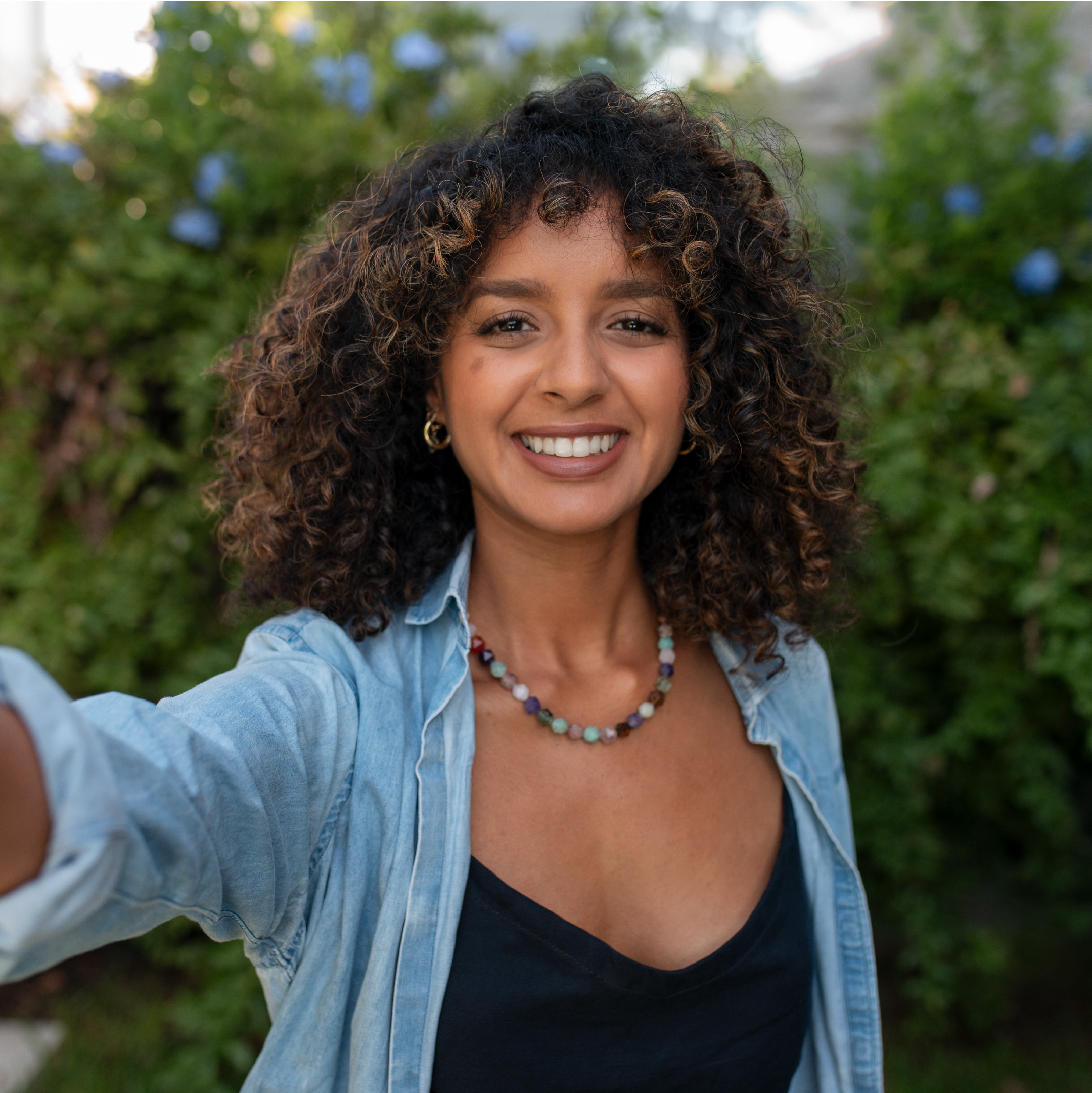 Happy woman after participating in the Detox Chefs program, highlighting her journey of health and balance.